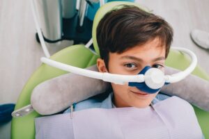 Child receiving laughing gas
